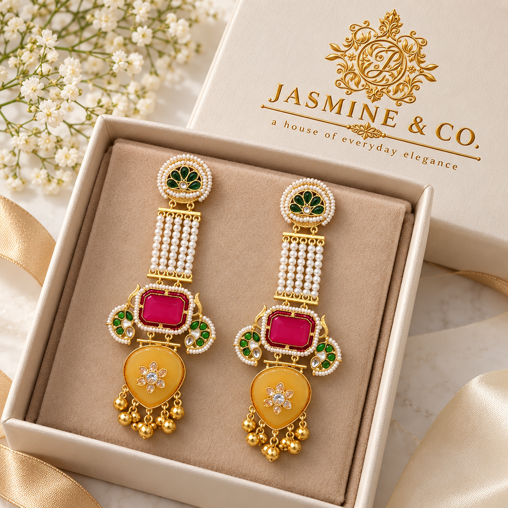 Jasmine and Co red and yellow gold plated Kashmiri long earrings — earring pair in Jasmine and Co branded gift box