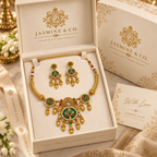 Gold-plated round light green stone necklace set in Jasmine & Co. packaging box