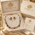 AD multi-color gold-plated necklace set in Jasmine & Co. packaging box