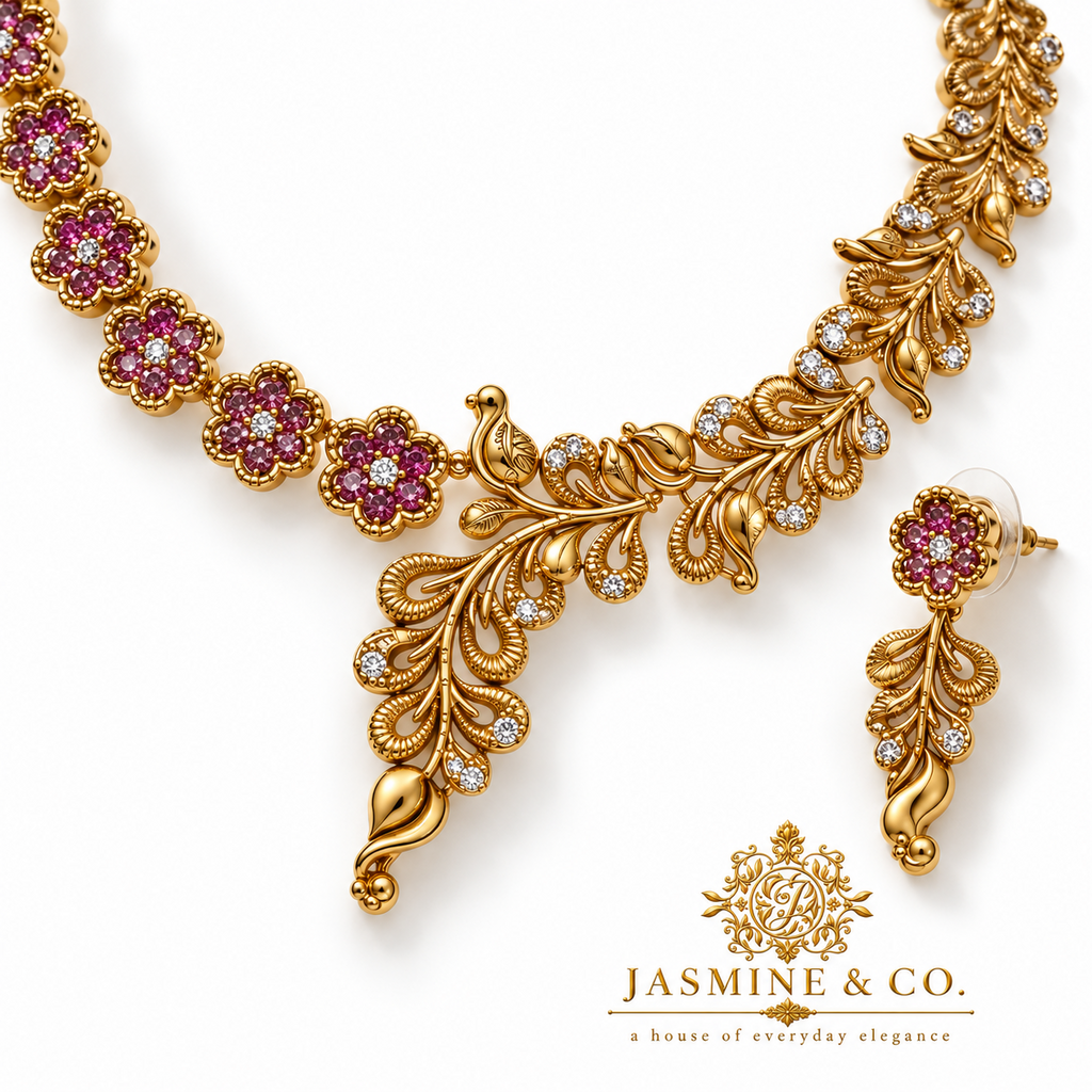 Close-up detail of fine stone gold-plated floral and leaf necklace set