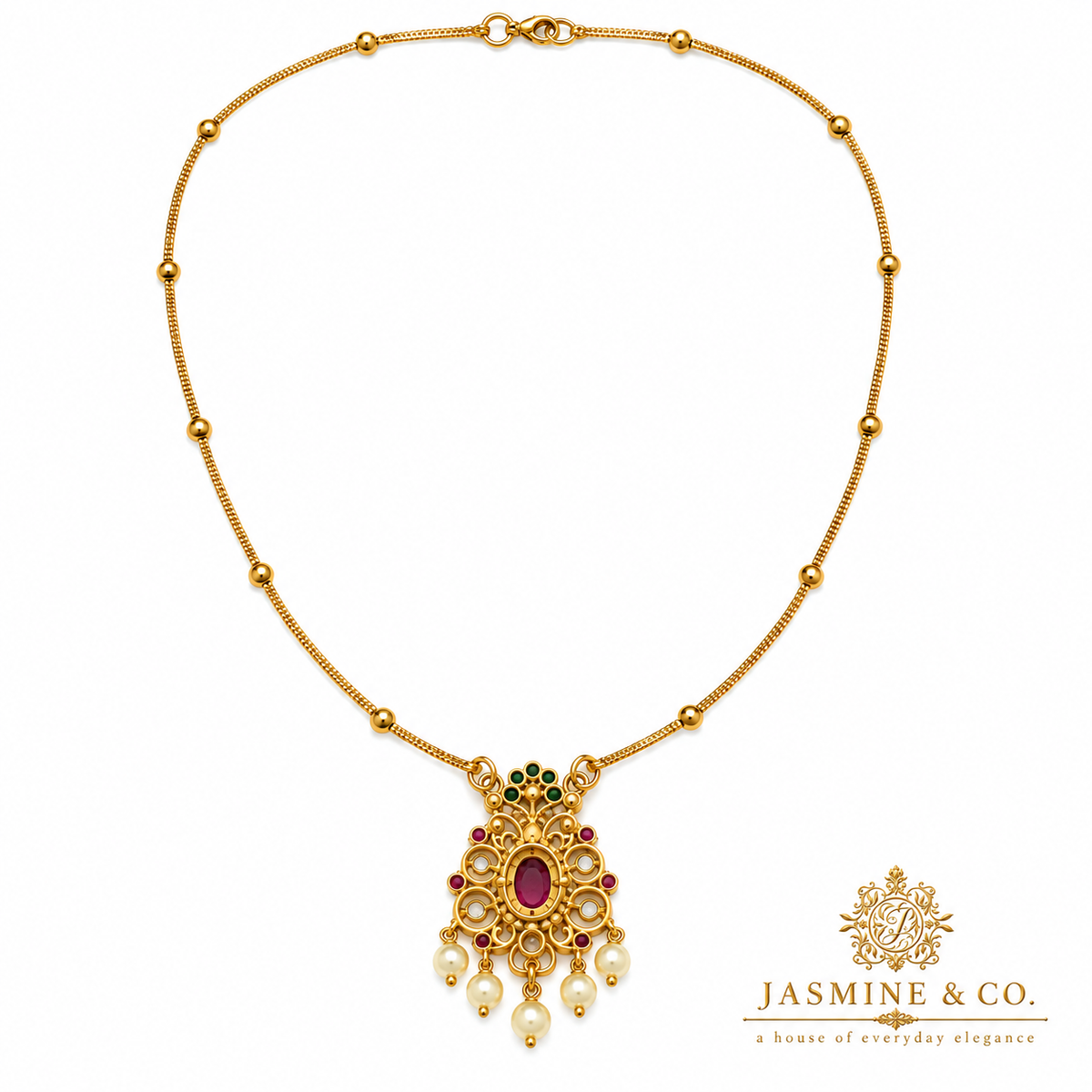 Back side view of gold-plated red stone pendant necklace