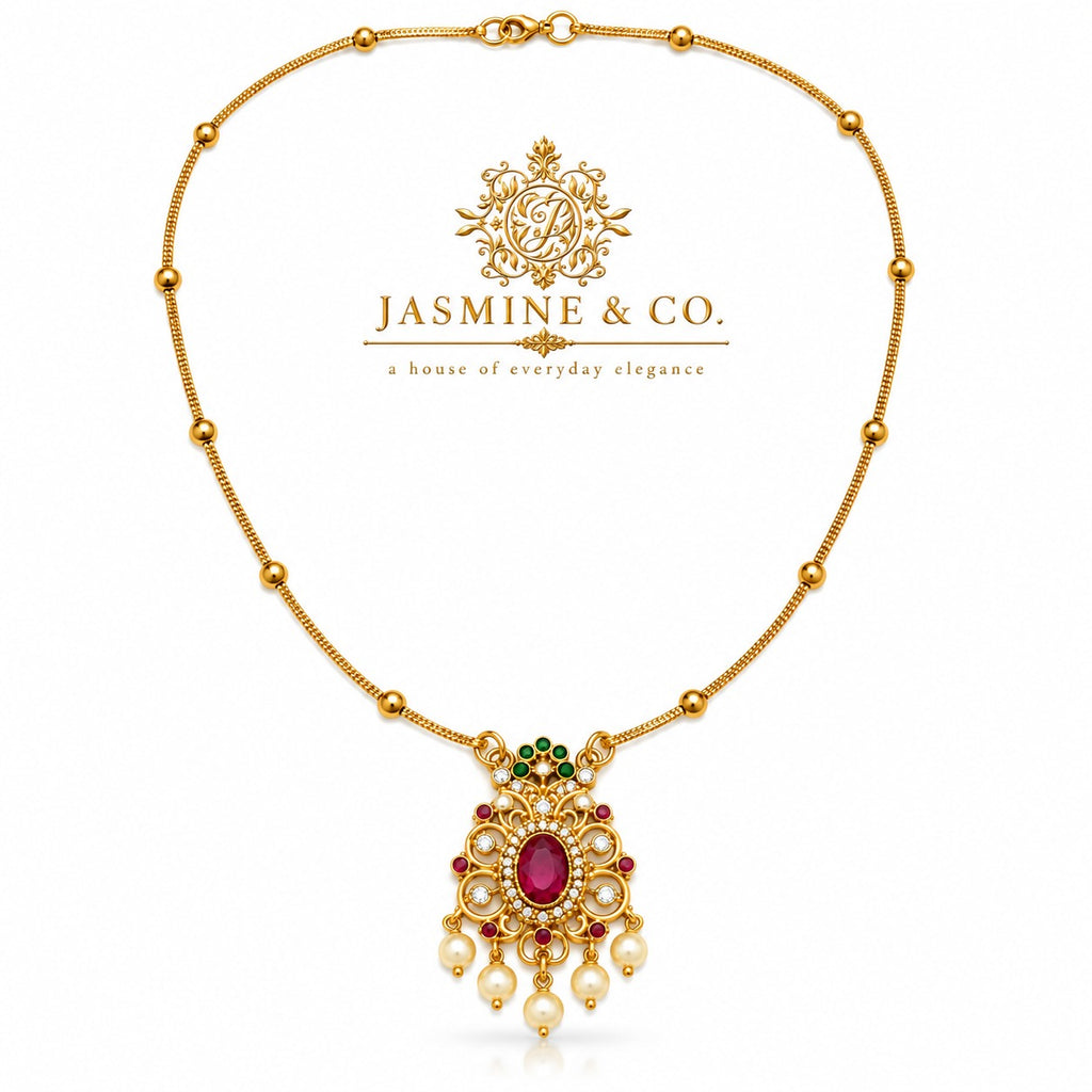 Gold-plated red stone pendant necklace, studio hero image