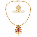 Gold-plated red stone pendant necklace, studio hero image