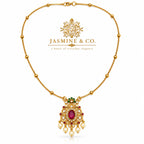 Gold-plated red stone pendant necklace, studio hero image