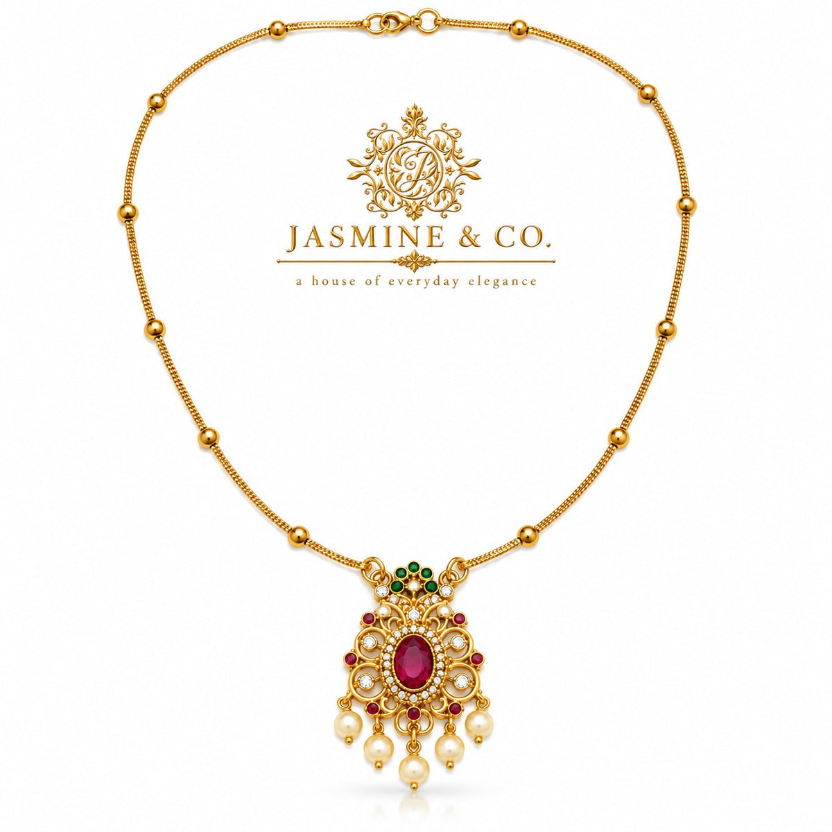 Gold-plated red stone pendant necklace, studio hero image