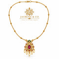 Red stone gold-plated pendant necklace included in Jasmine & Co. gift pack for Sister