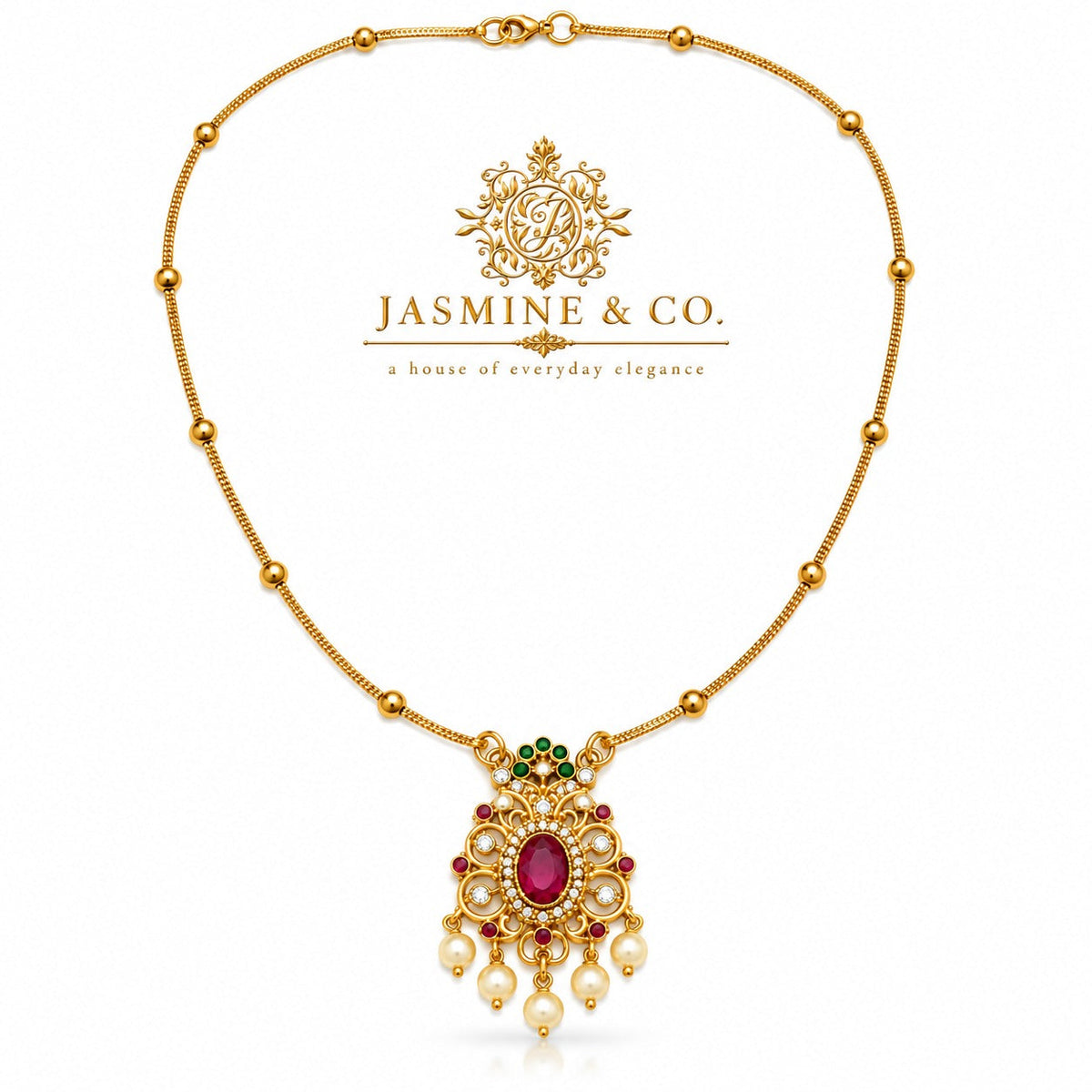 Red stone gold-plated pendant necklace included in Jasmine & Co. gift pack for Sister
