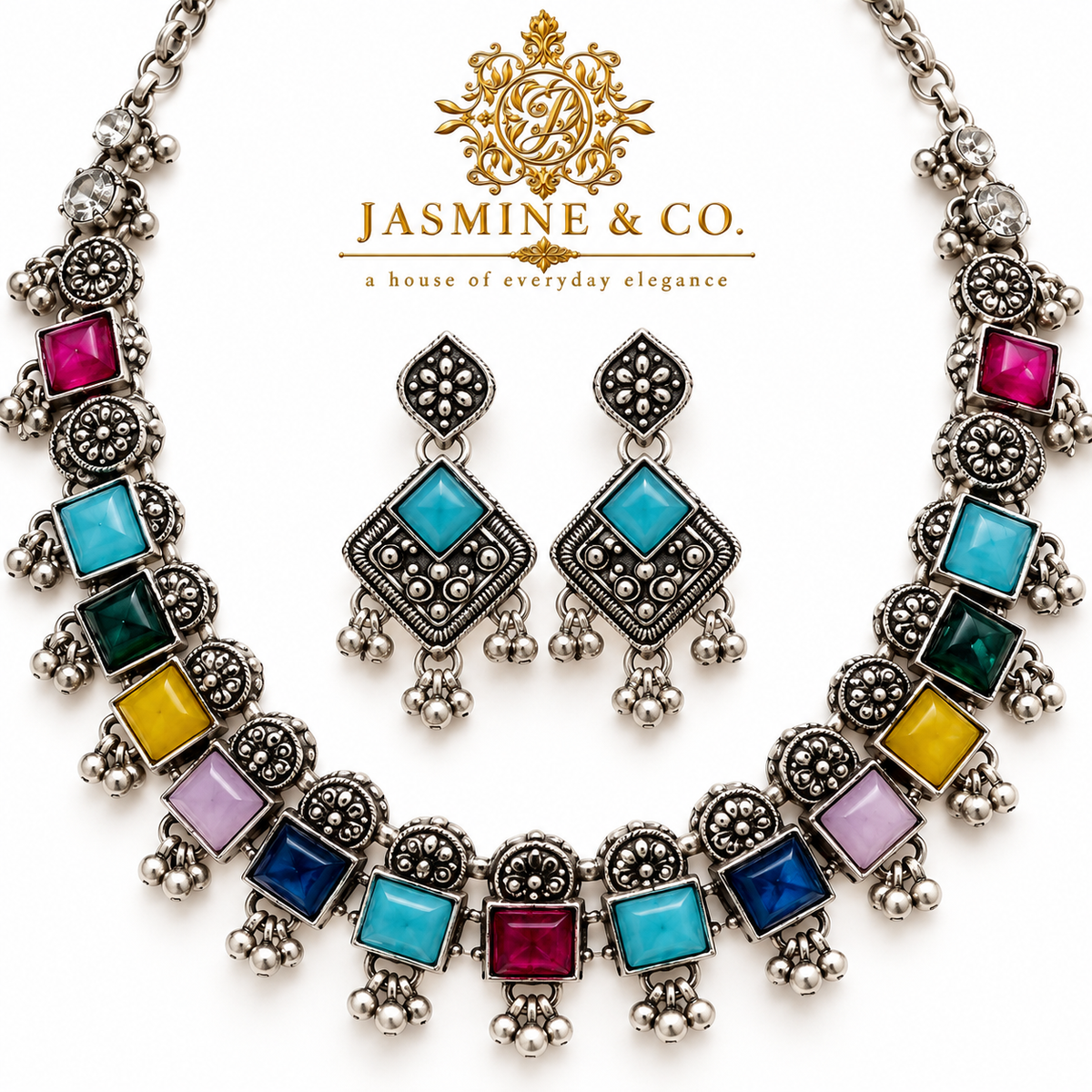 Close-up detailing of oxidized silver multicolor necklace with turquoise stone earrings