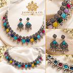 Multiple angles of oxidized silver multicolor necklace and matching earrings