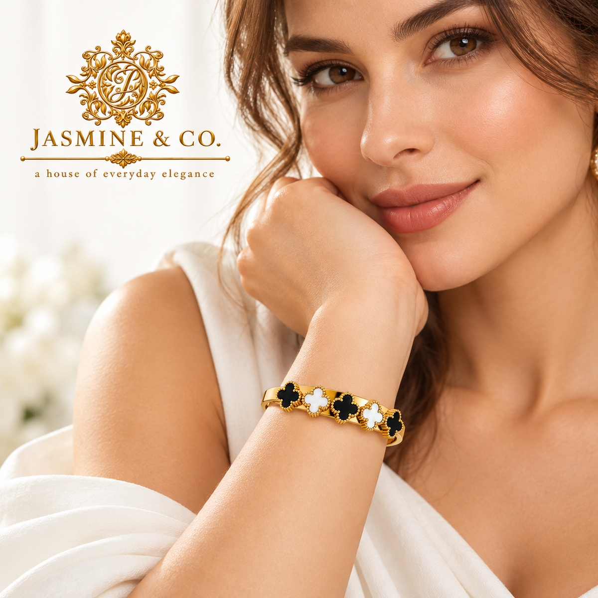 Jasmine & Co. Gold-Plated Anti-Tarnish Black & White Clover Bangle Bracelet – model wearing