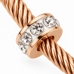 Jasmine & Co. Gold-Plated Anti-Tarnish Evil Eye Cable Bangle Bracelet with Crystal Accents – crystal ring and cable close-up