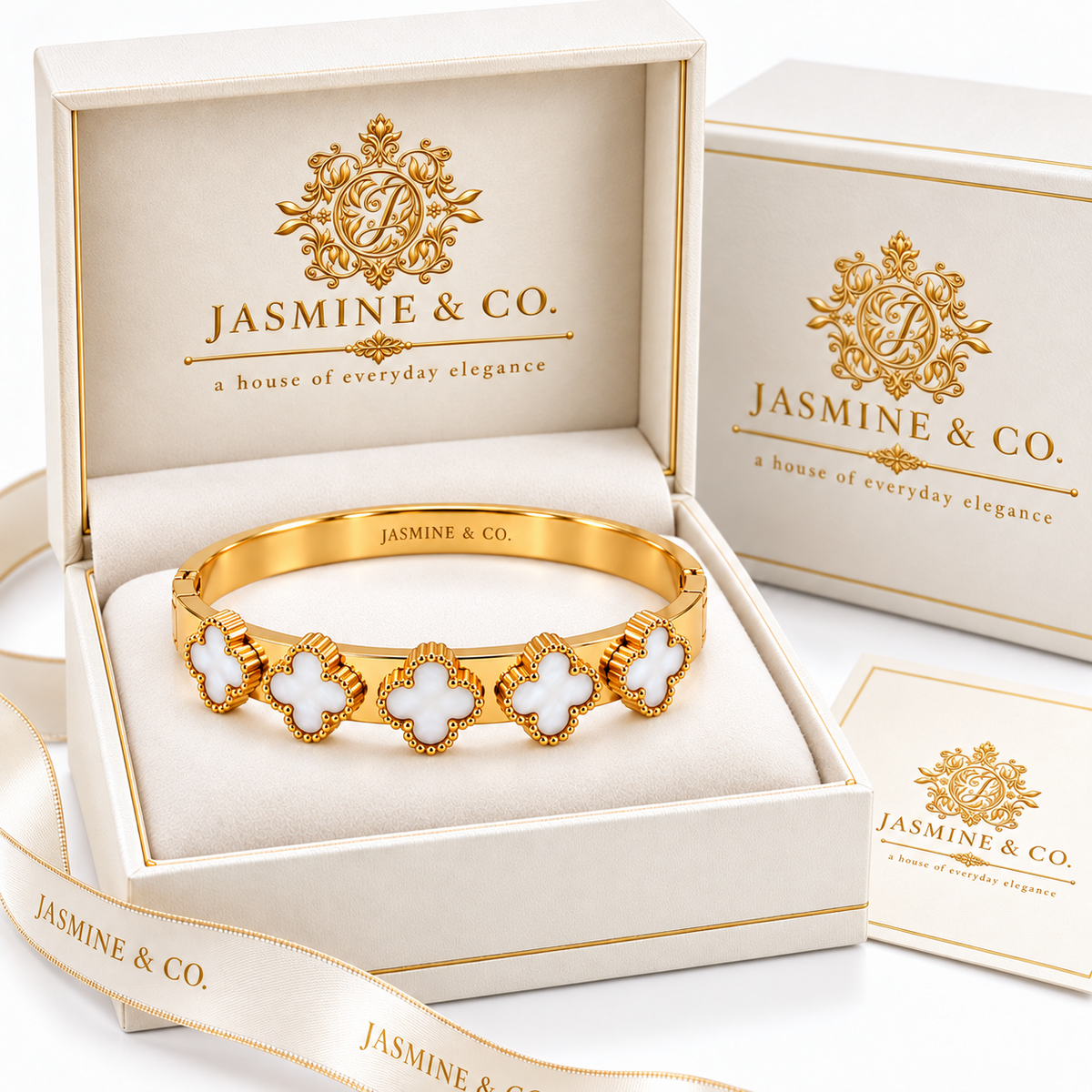 Jasmine & Co. White Clover Bangle Bracelet – branded gift box