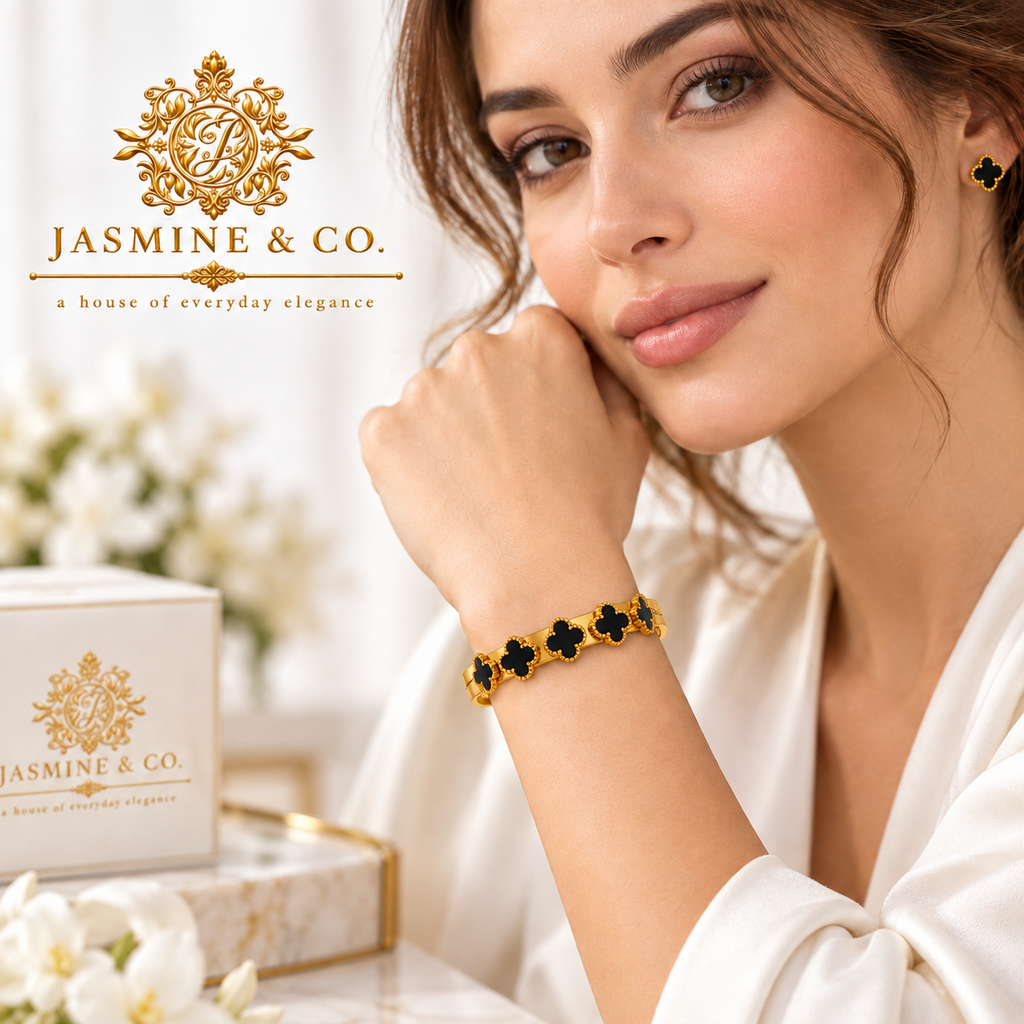 Jasmine & Co. model wearing black clover bangle bracelet