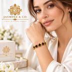 Jasmine & Co. model wearing black clover bangle bracelet