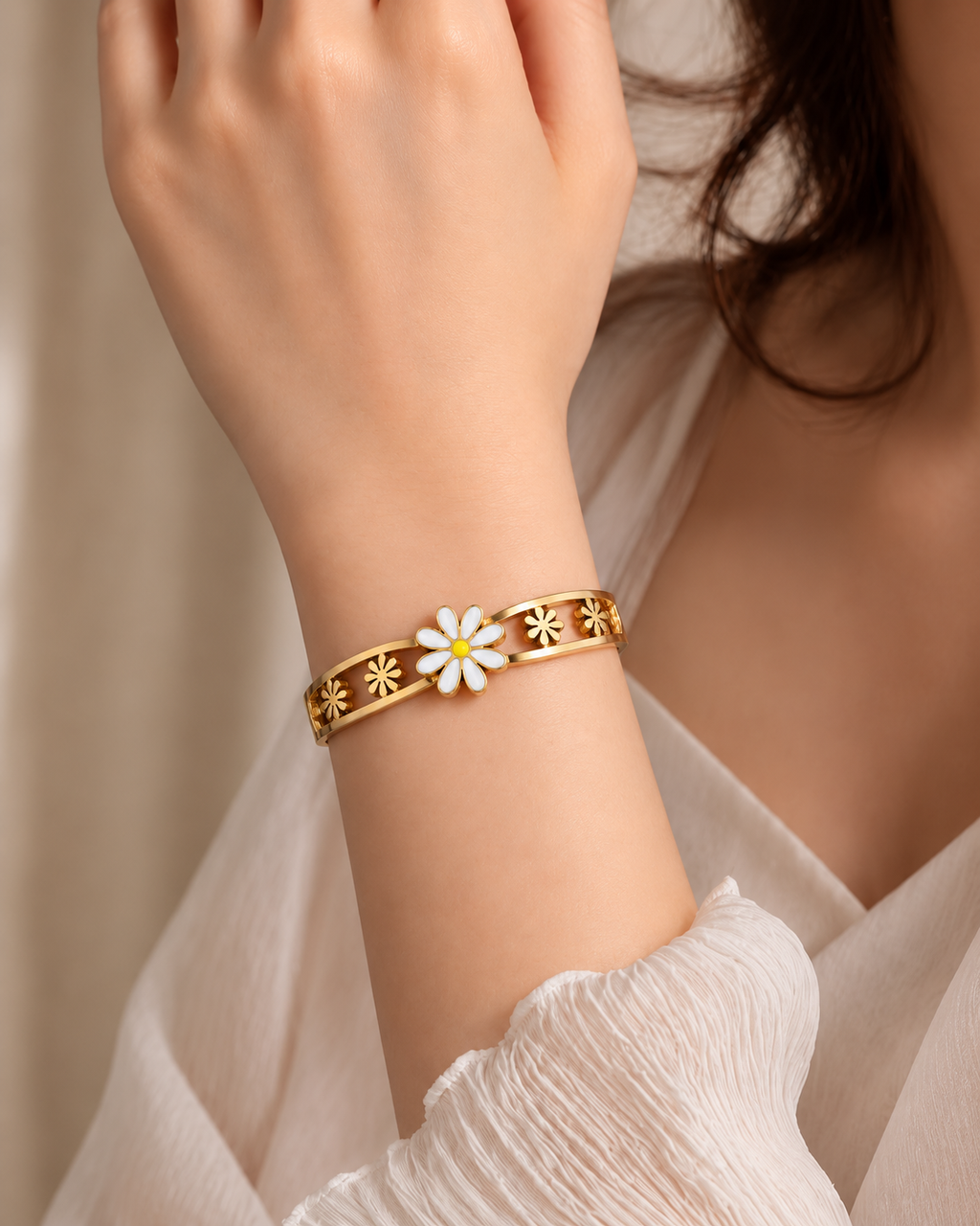 Woman wearing anti-tarnish white flower bracelet in golden stainless steel